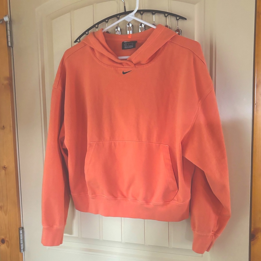 Orange Nike sweatshirt